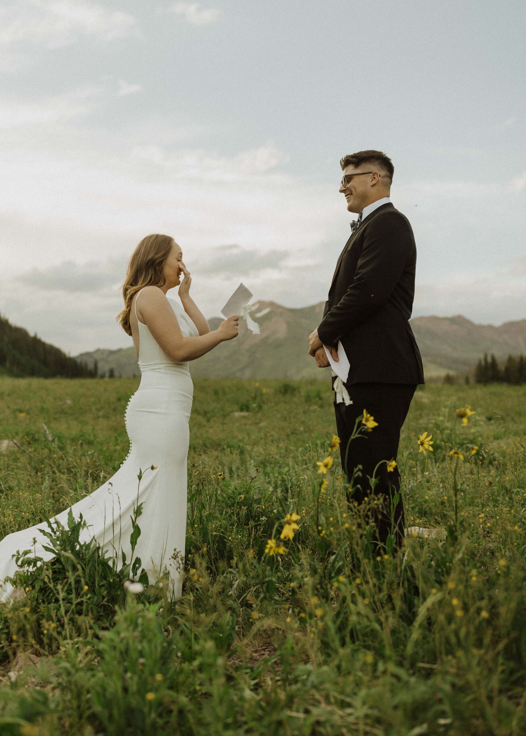 Couple saying vows in mountain