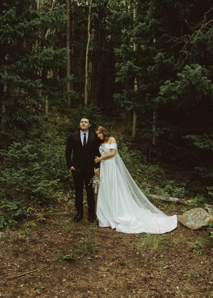 bride and groom photos in the mountains for their cabin elopement at flying moon cabins 