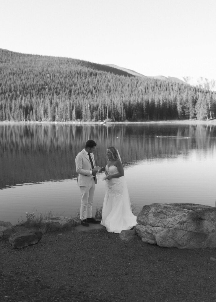 Wedding couple reading vows at Echo Lake