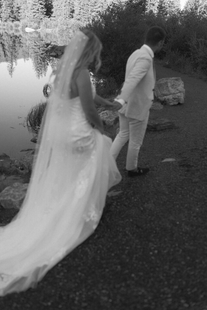 Wedding couple taking photos at Echo Lake