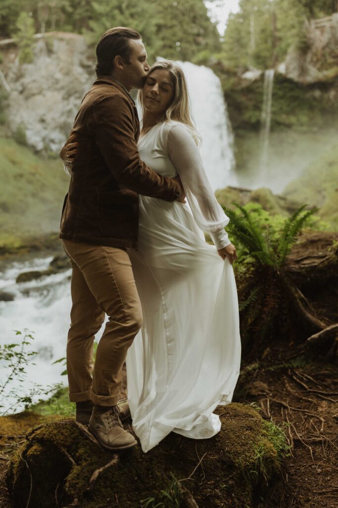 Sahalie Falls Elopement Couple Taking Photos