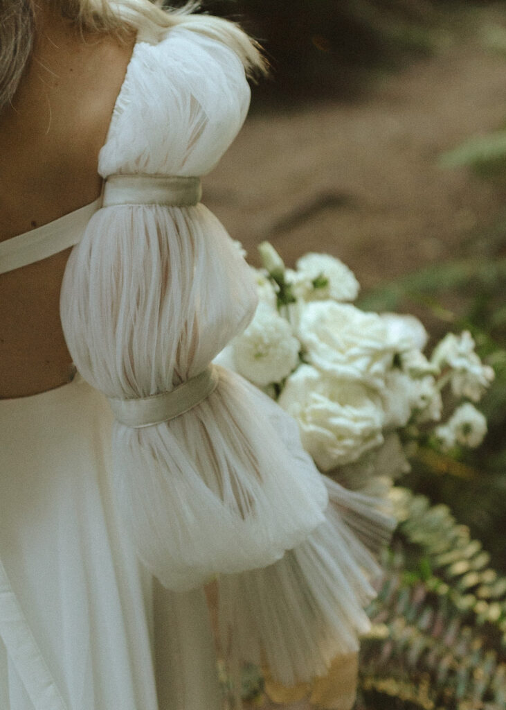 close up photo of a bride in the redwoods 
