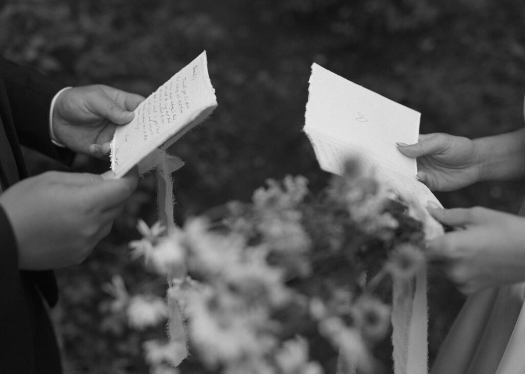 couple reading vows at their colorado elopement 