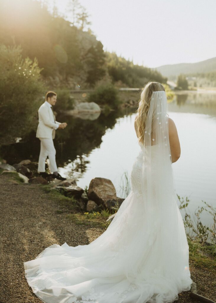 couple taking photos for their Colorado wedding 