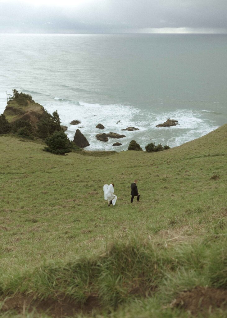 bride and groom walking at their Gods Thumb Elopement 