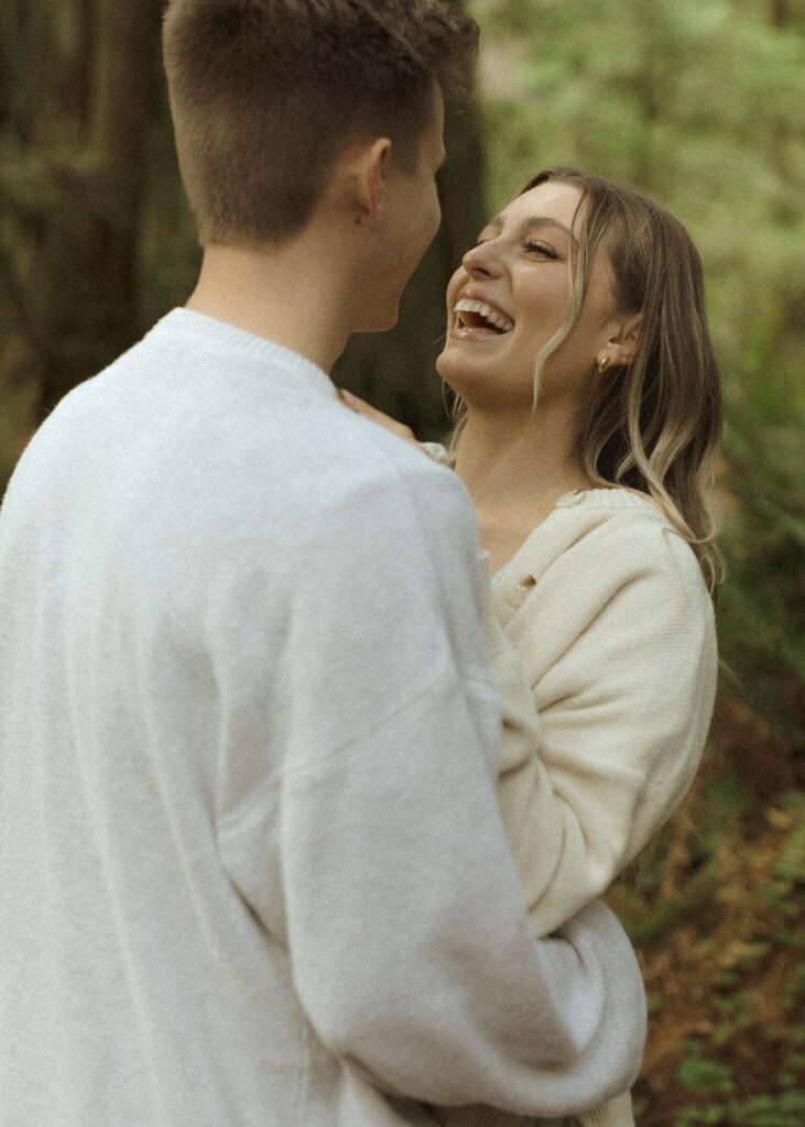 couple posing during their redwoods engagement photos 