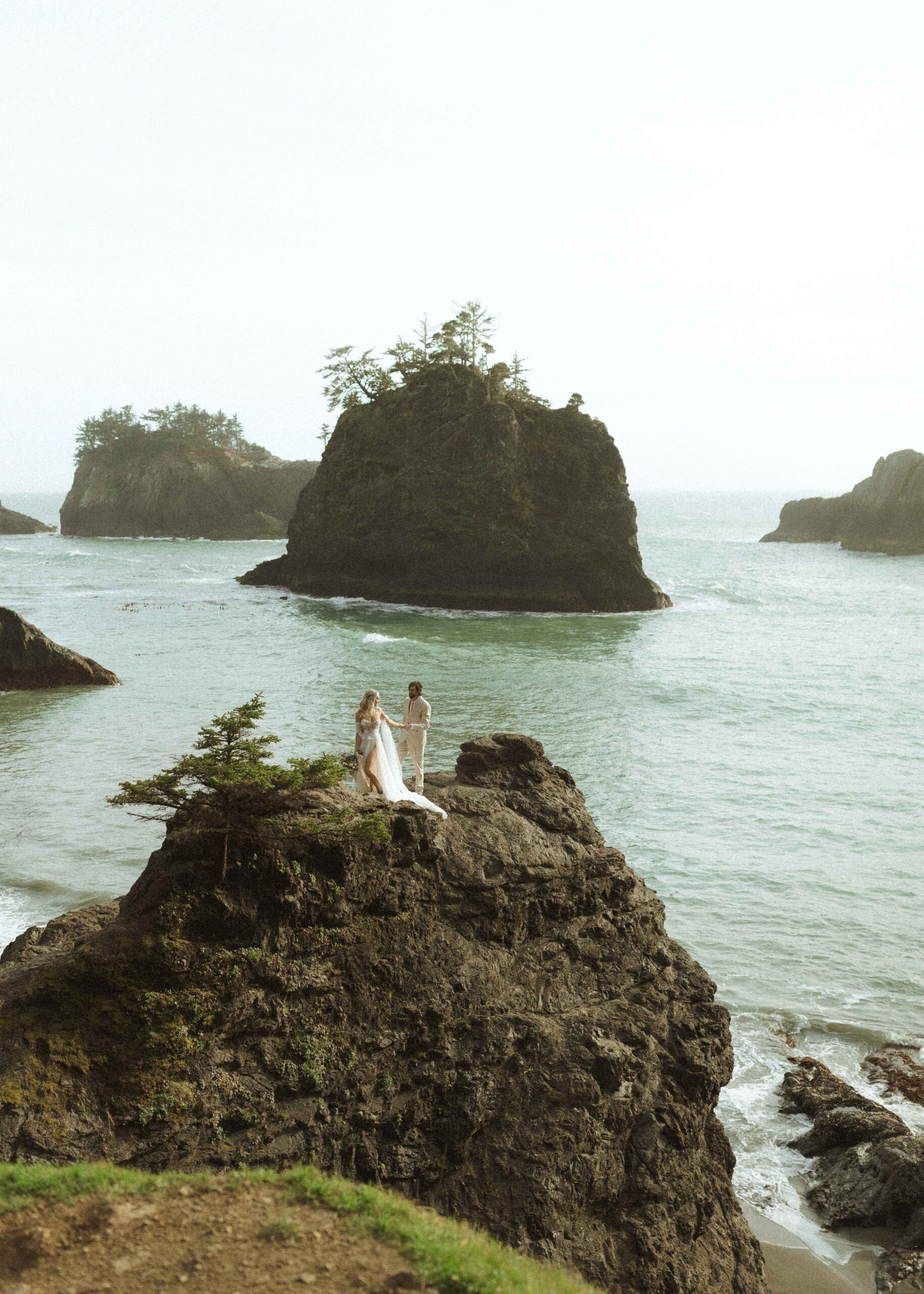 couple taking photos for their Oregon wedding
