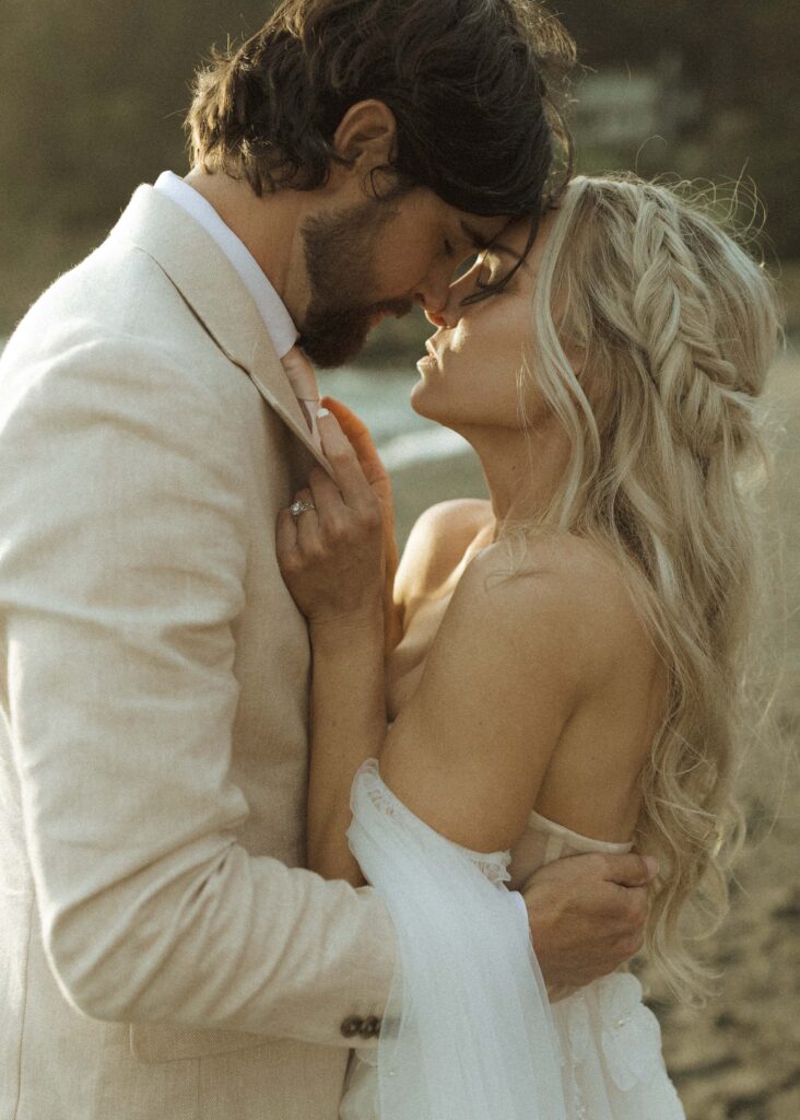 bride and groom taking sunset photos for their brookings oregon elopement 