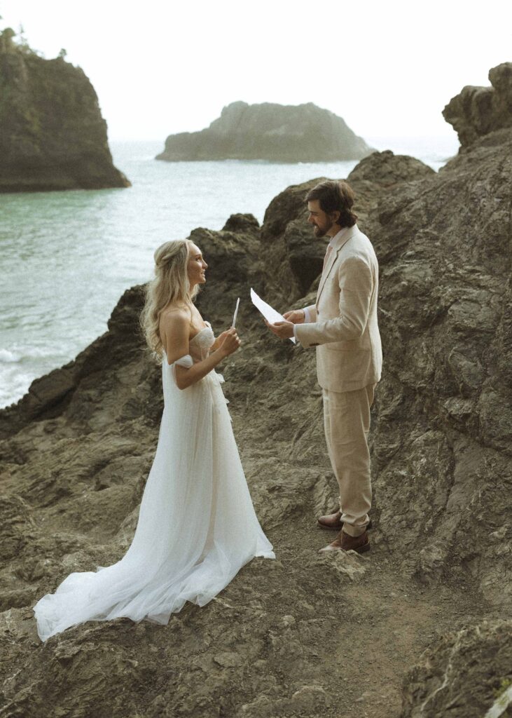 bride and groom reading vows for their brookings oregon elopement 