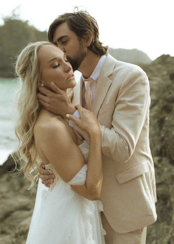 bride and groom taking sunset photos for their brookings oregon elopement 