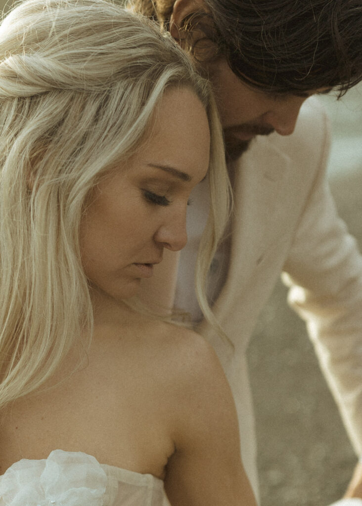 bride and groom taking sunset photos for their brookings oregon elopement 