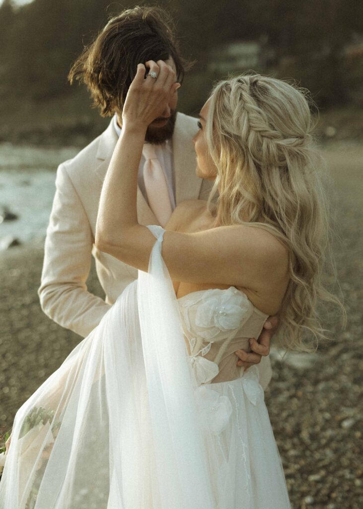 bride and groom taking sunset photos for their brookings oregon elopement 