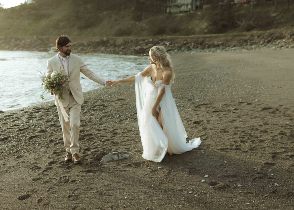 bride and groom taking sunset photos for their brookings oregon elopement 