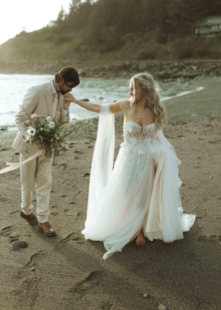 bride and groom taking sunset photos for their brookings oregon elopement 