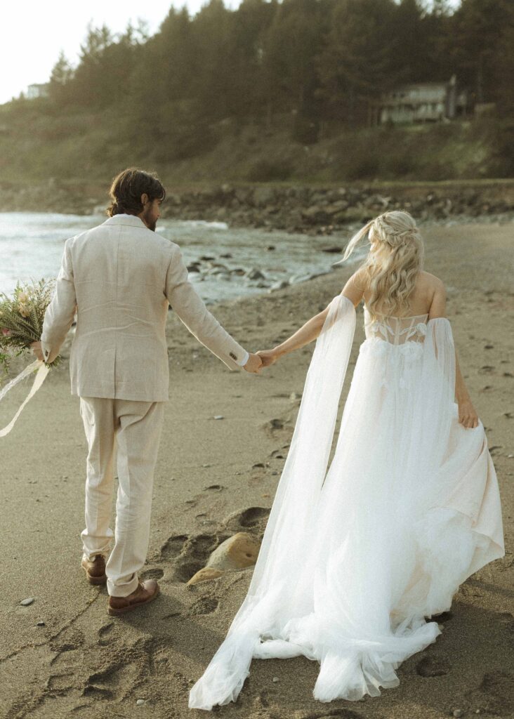 bride and groom taking sunset photos for their brookings oregon elopement 