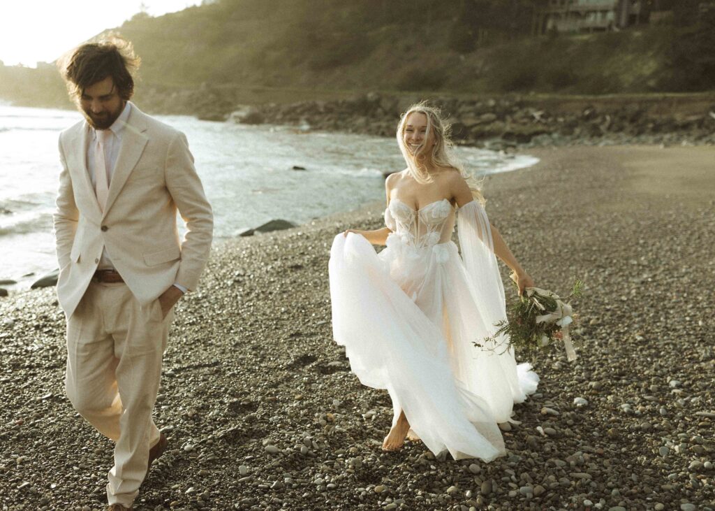 bride and groom taking sunset photos for their brookings oregon elopement 