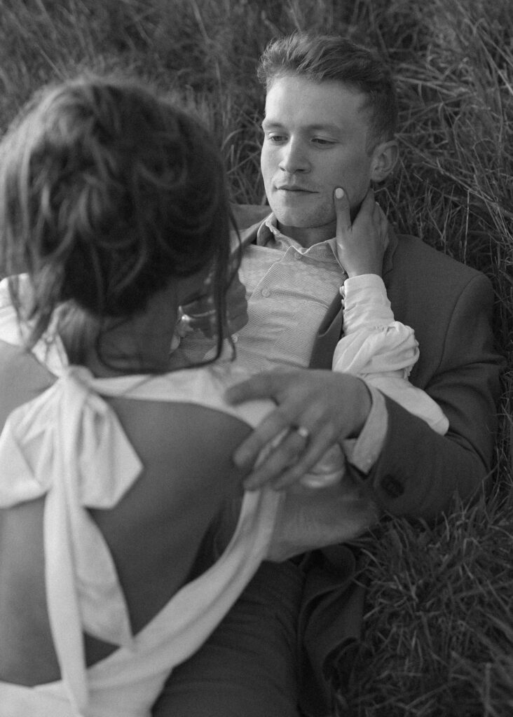 couple laying in the grass for their oregon elopement 