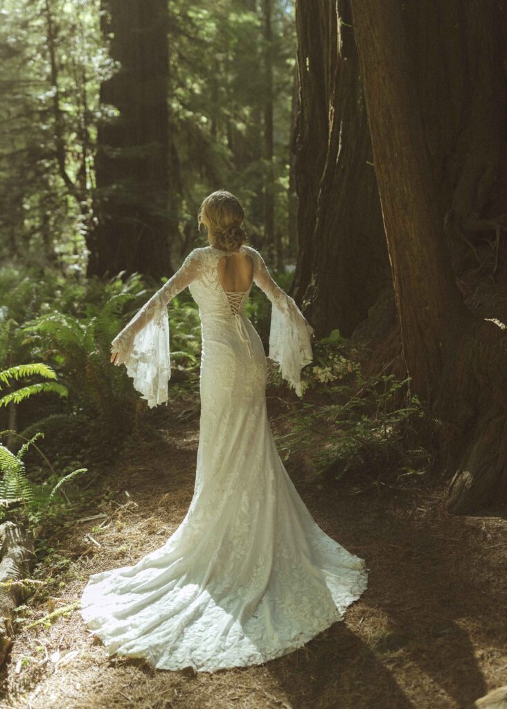 bride taking photos in the Redwoods for her Redwoods Oregon elopement 