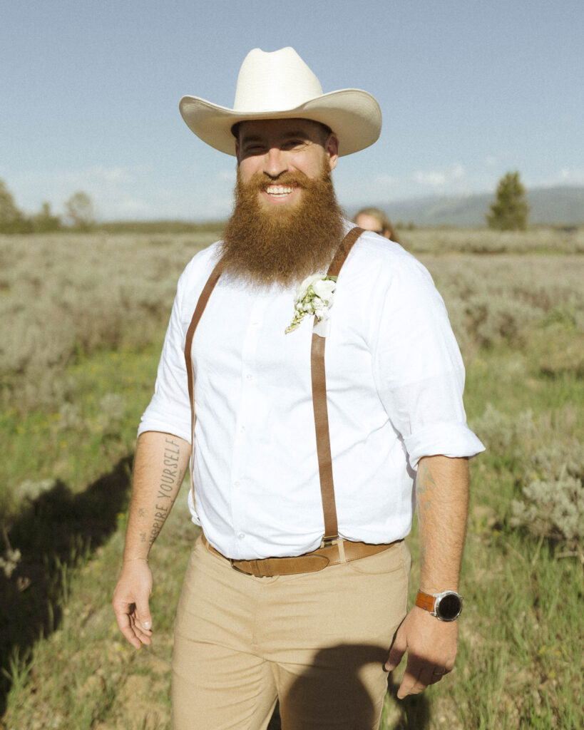 groom excited for his mountain view turnout wedding 