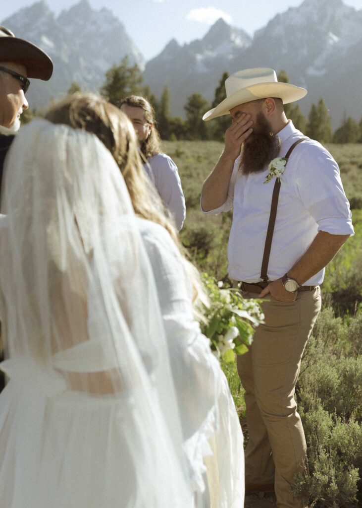 bride walking down the aisle for her mountain view turnout wedding 