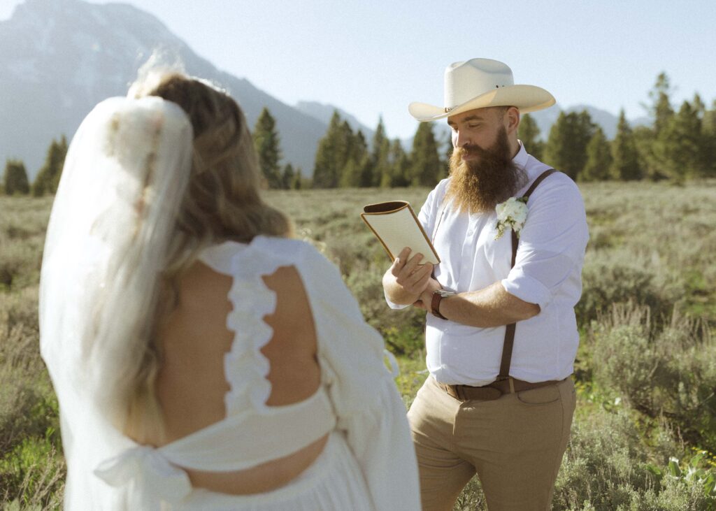 groom reading vows for his mountain view turnout wedding 