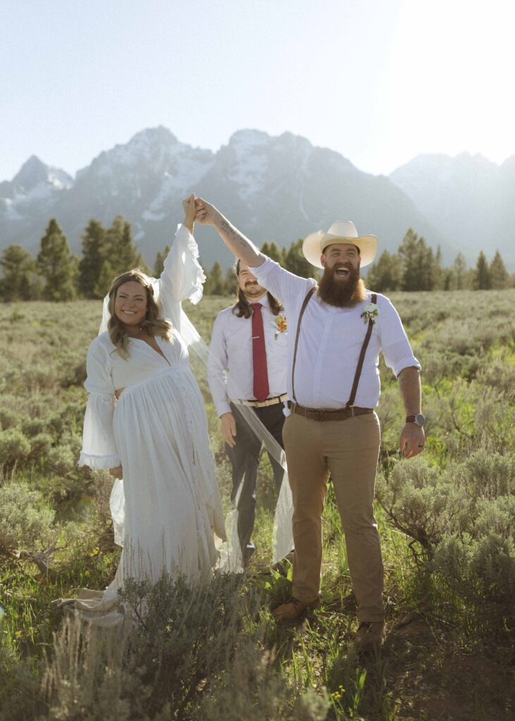 couple celebrating at their mountain view turnout wedding 