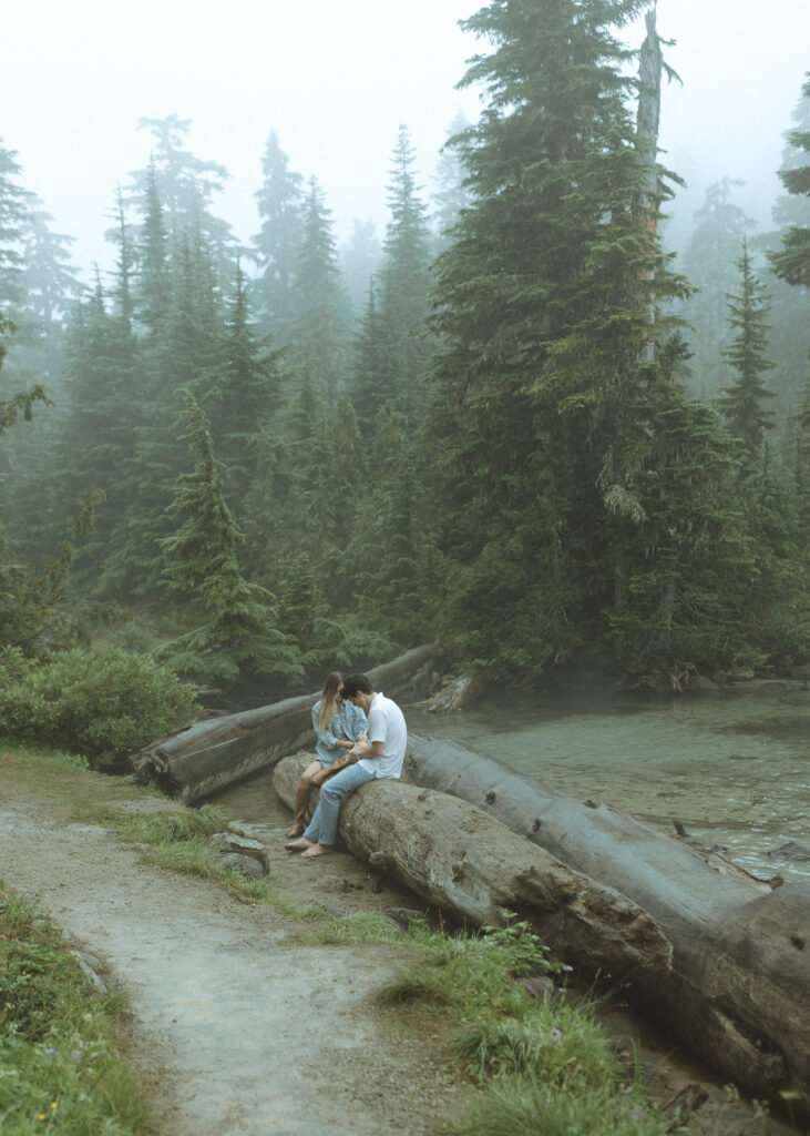 bride and groom writing their vows for their Mowich Lake Elopement in Mt. Rainier National Park 