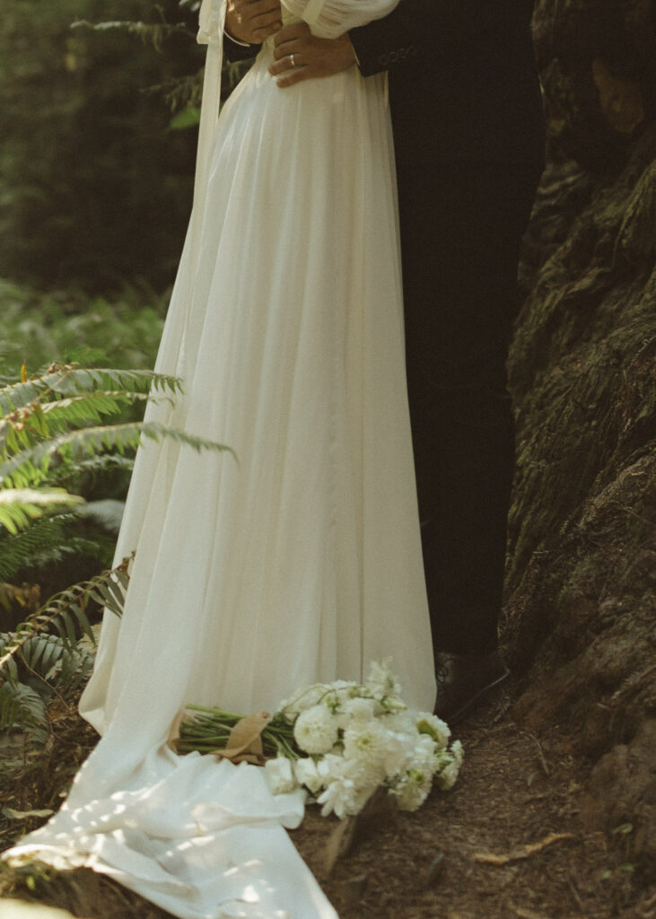 couple eloping in the redwoods 