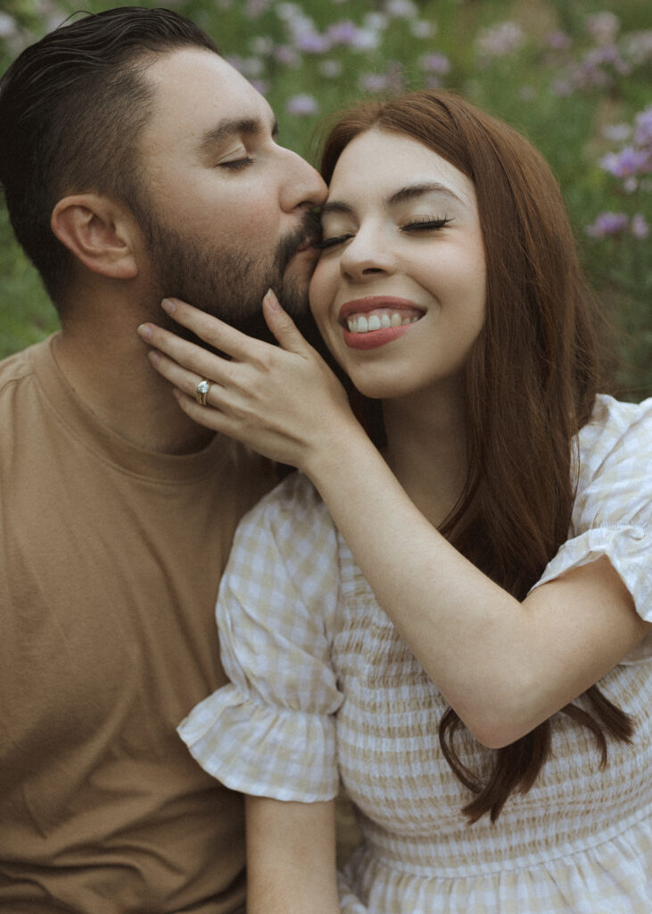 bride and groom taking photos in their casual outfit for their silver forest trail elopement 