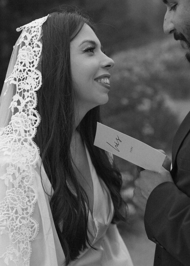 bride and groom reading their vows for their silver forest trail elopement 