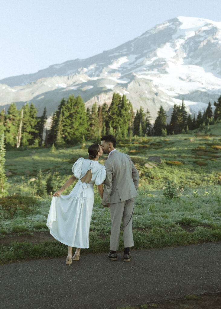 bride and groom taking photos for their skyline trail elopement 