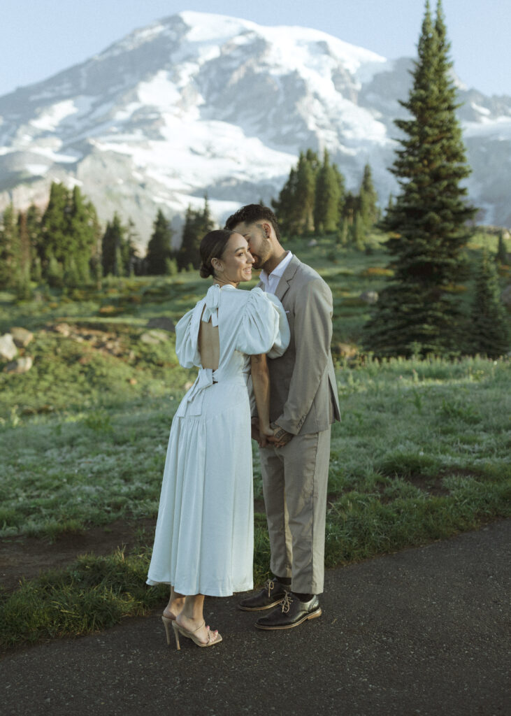 bride and groom taking photos for their skyline trail elopement 