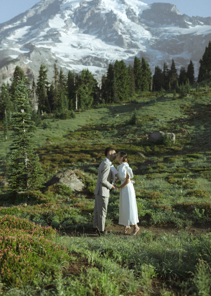 bride and groom reading vows for their skyline trail elopement 