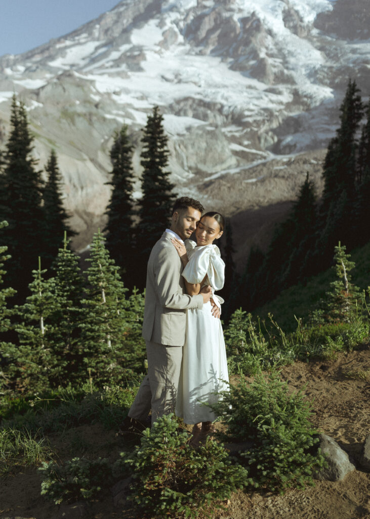 bride and groom taking photos for their skyline trail elopement 