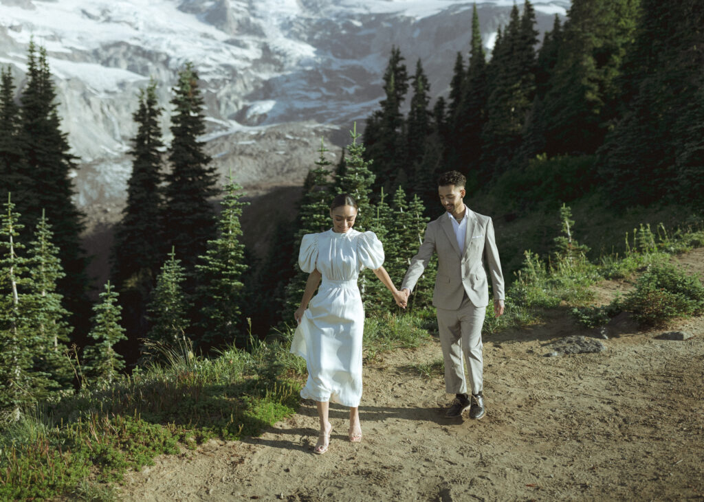 bride and groom taking photos for their skyline trail elopement 