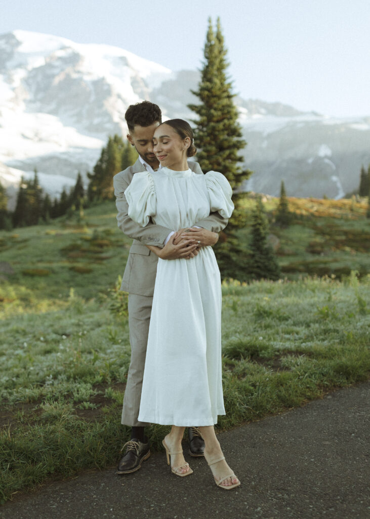 bride and groom taking photos for their skyline trail elopement 