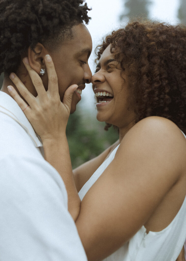 couple smiling for their Washington couples photos