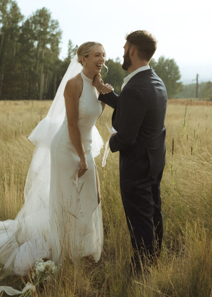 bride and groom reading vows for their fall flagstaff elopement