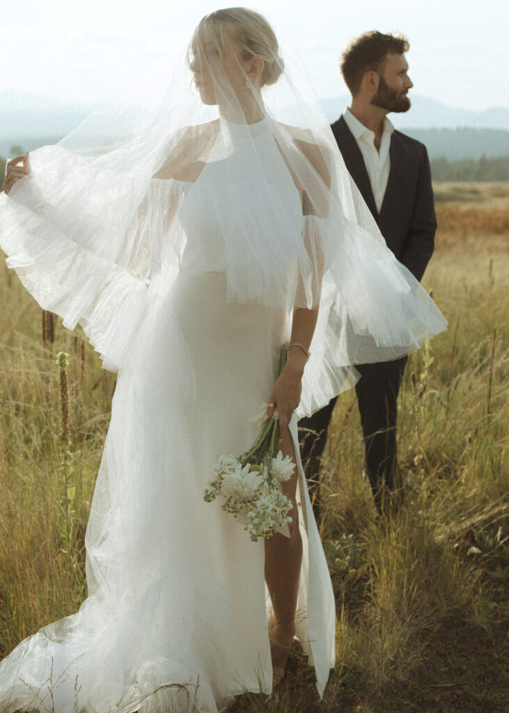 bride and groom taking photos for their fall flagstaff elopement