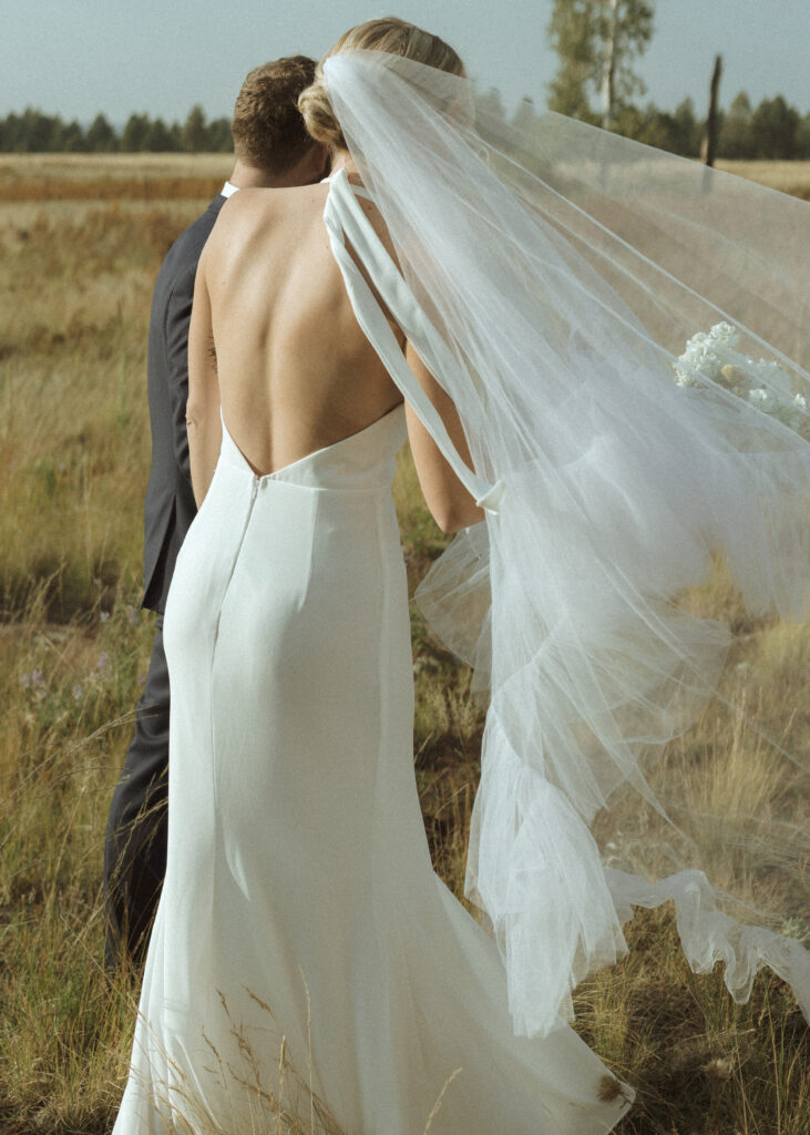 bride and groom walking for their fall flagstaff elopement