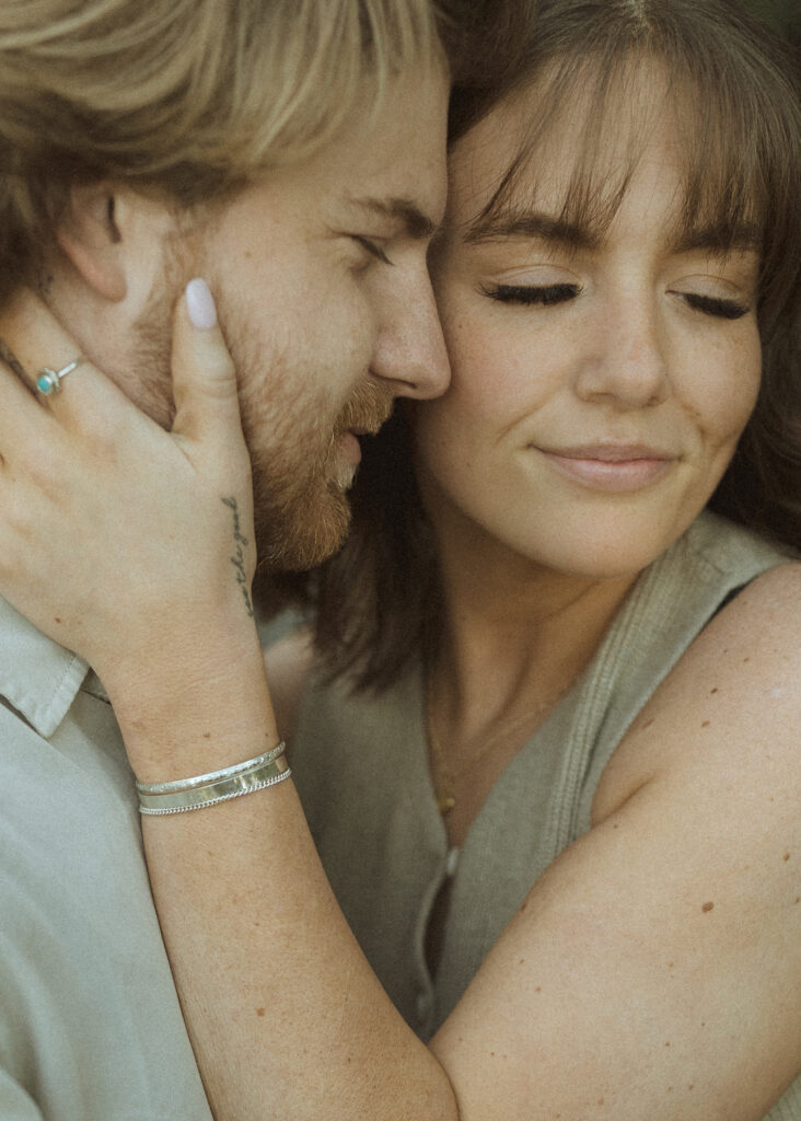 couple posing for their flagstaff engagement photos