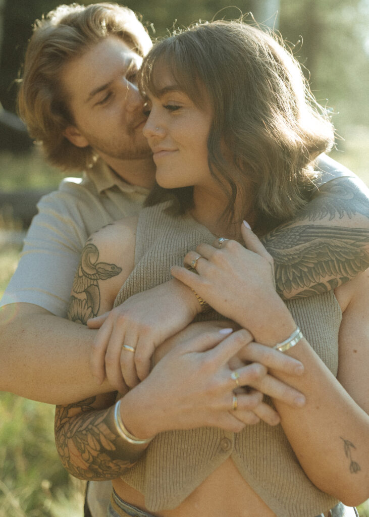 couple posing for their flagstaff engagement photos