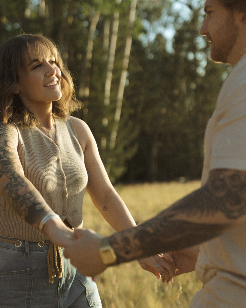 couple posing for their flagstaff engagement photos