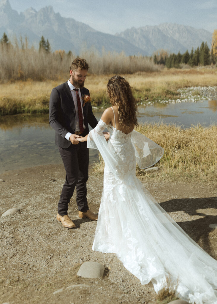 bride and groom going a first look at Grand Teton National Park 