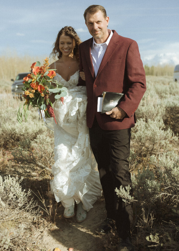 bride walking down the aisle at Grand Teton National Park 