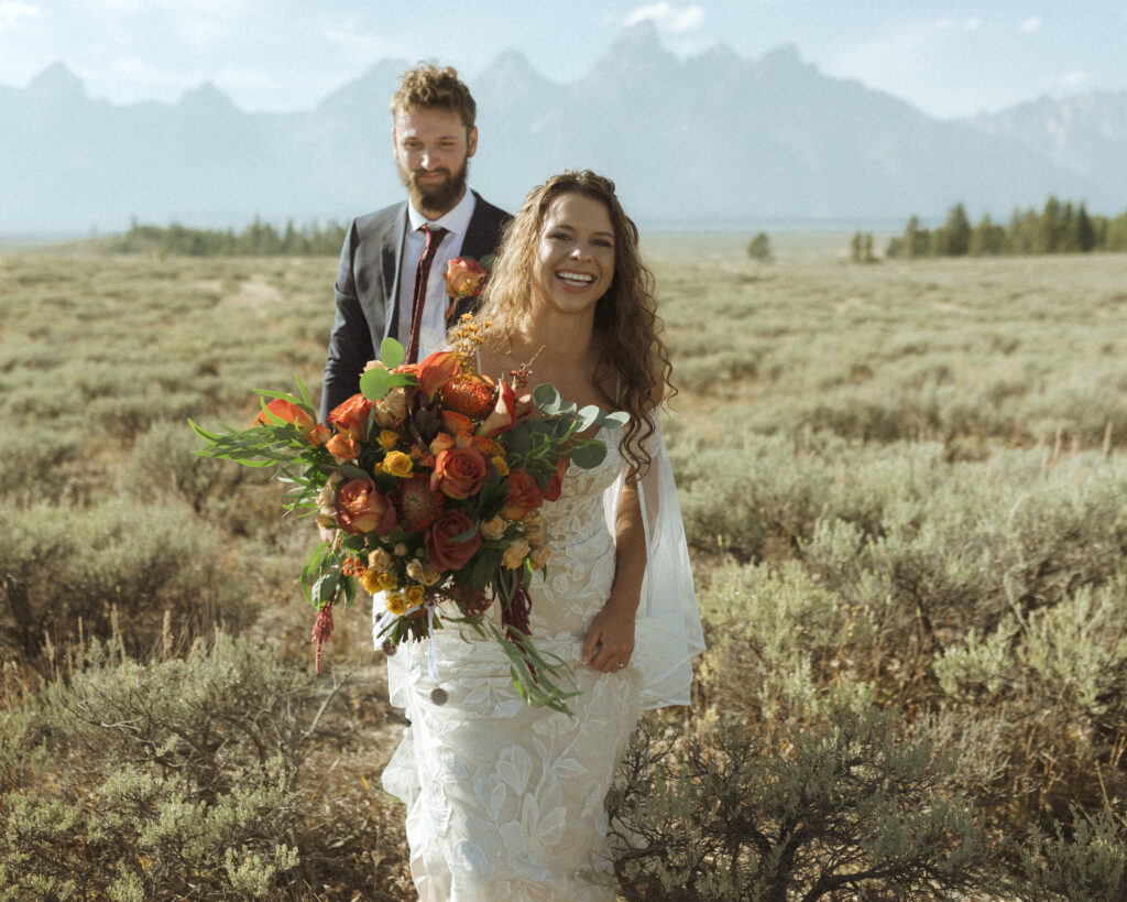 bride and groom happily married in the Grand Tetons 