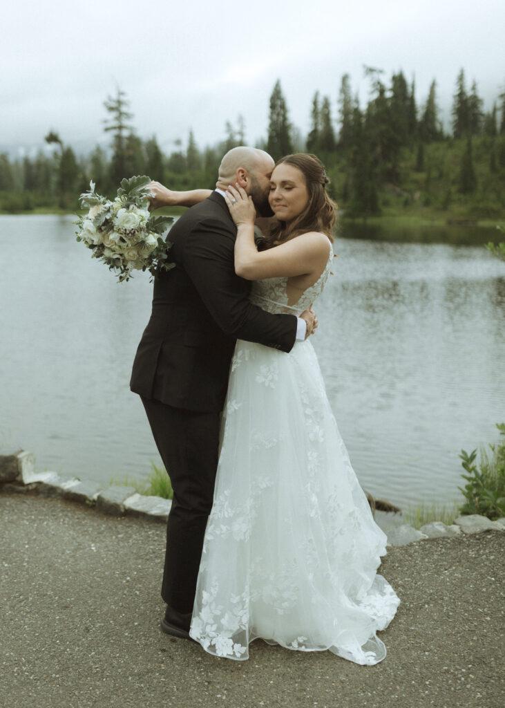 bride and groom take photos for their mount baker elopement 