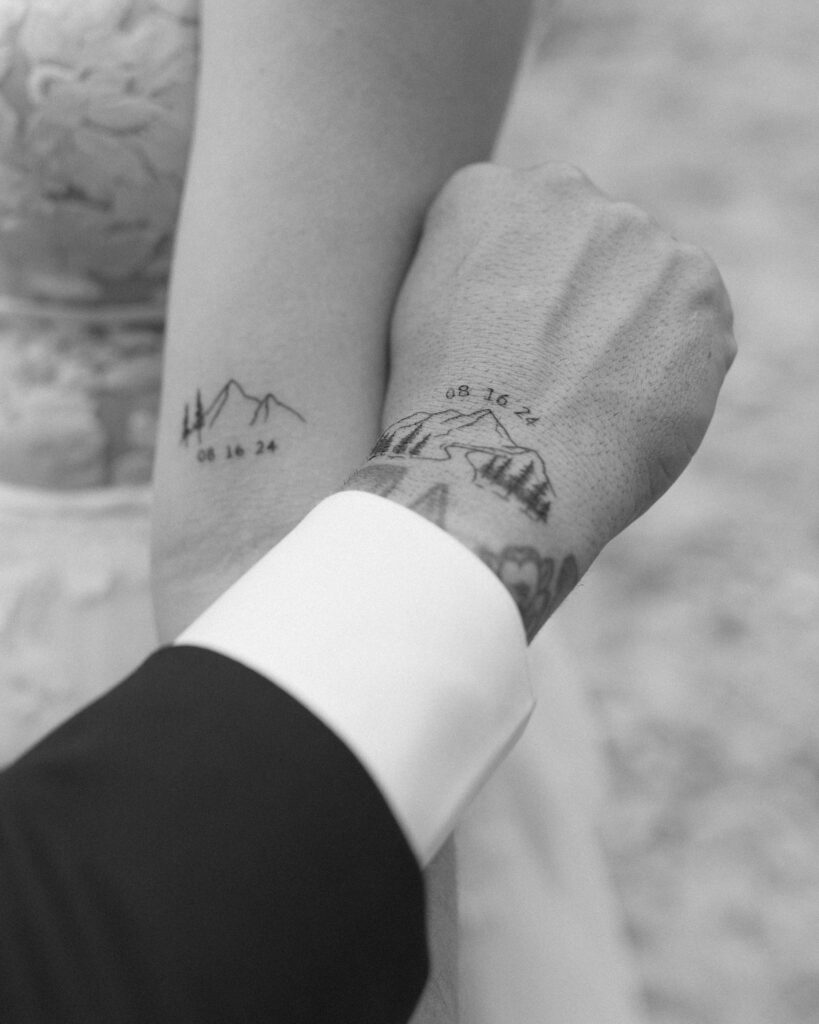 close up of a couples wedding tattoos for their Mount Baker Elopement 