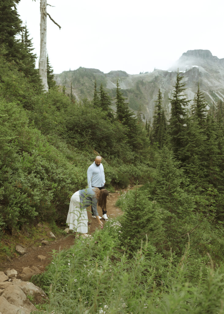 bride and groom walking on the trail for their Mount Baker Elopement 