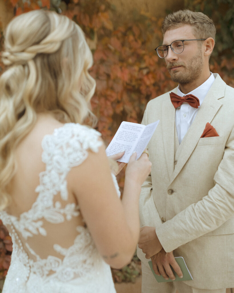 bride and groom reading vows at their Villa Parker Wedding 